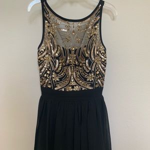 Quiz black and gold beaded dress